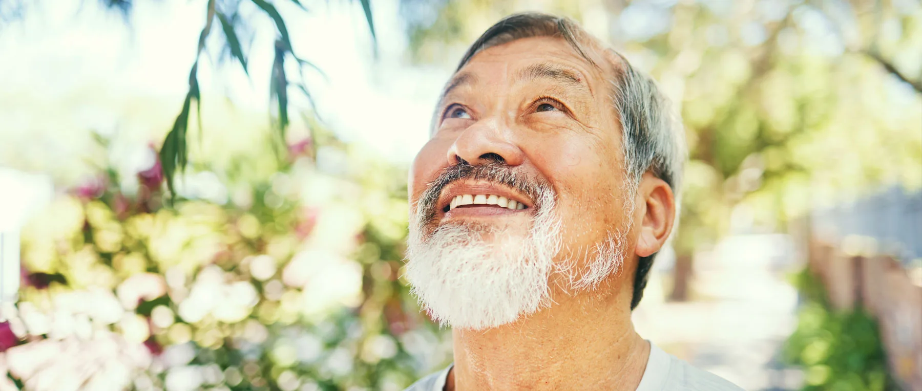 man happy walking in garden