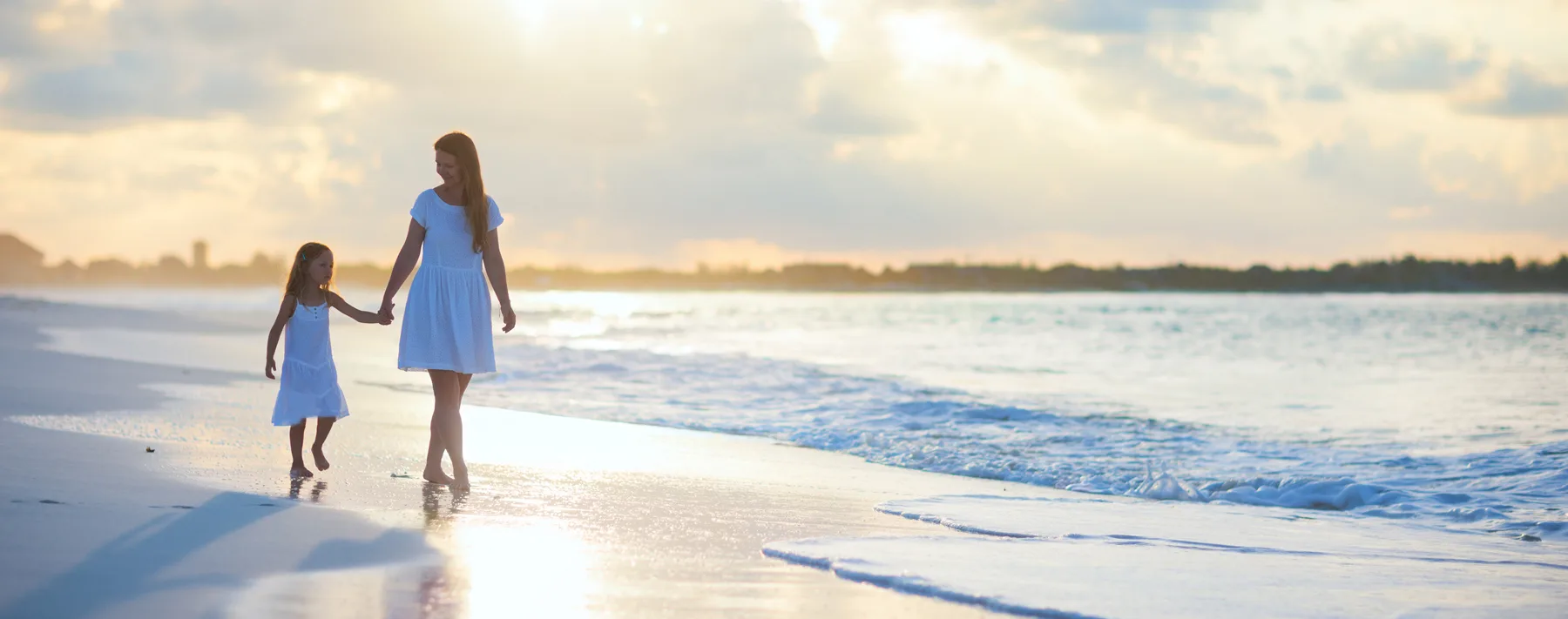 mother and child on beach