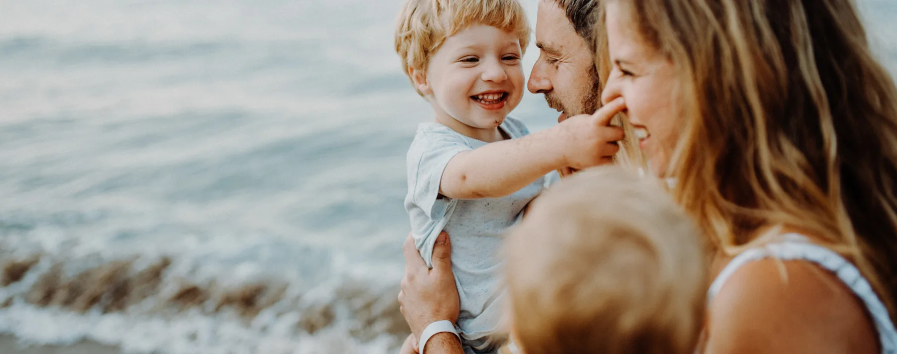 Happy family at the beach