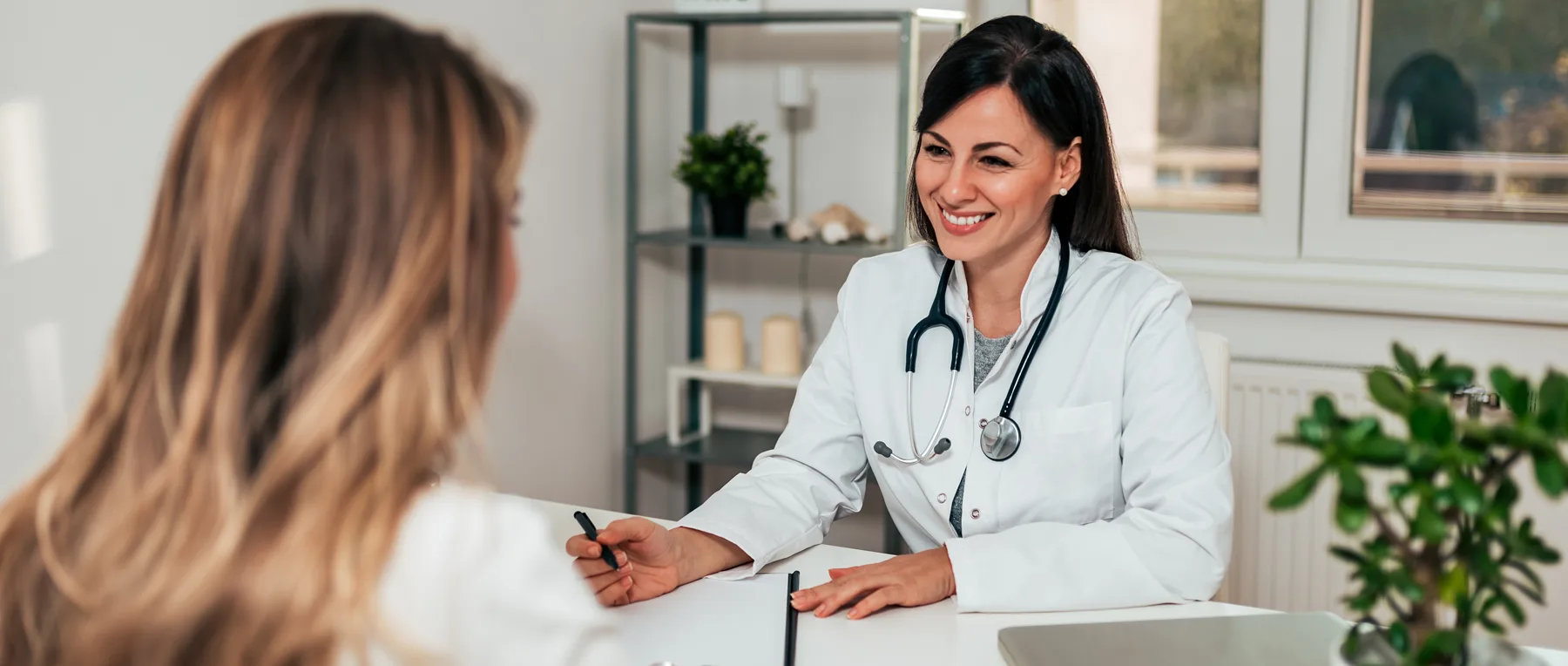 Doctor talking to patient