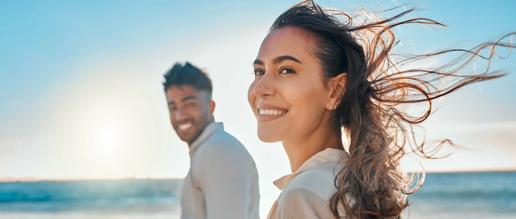 Couple walking on the beach