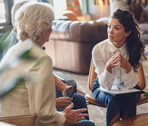 Couple talking with therapist