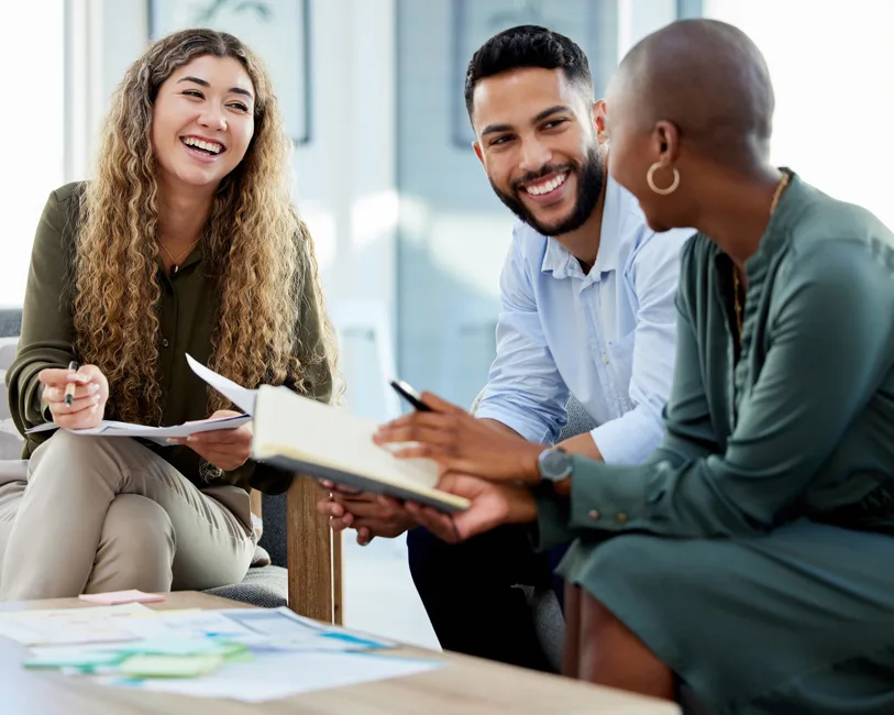 Group of people talking and smiling