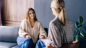 patient and counselor in session using CBT